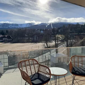 https://panorama-karkonoszy-apartamenty-komfort-z-widokiem-na-sniezke.karpacz-hotel.com